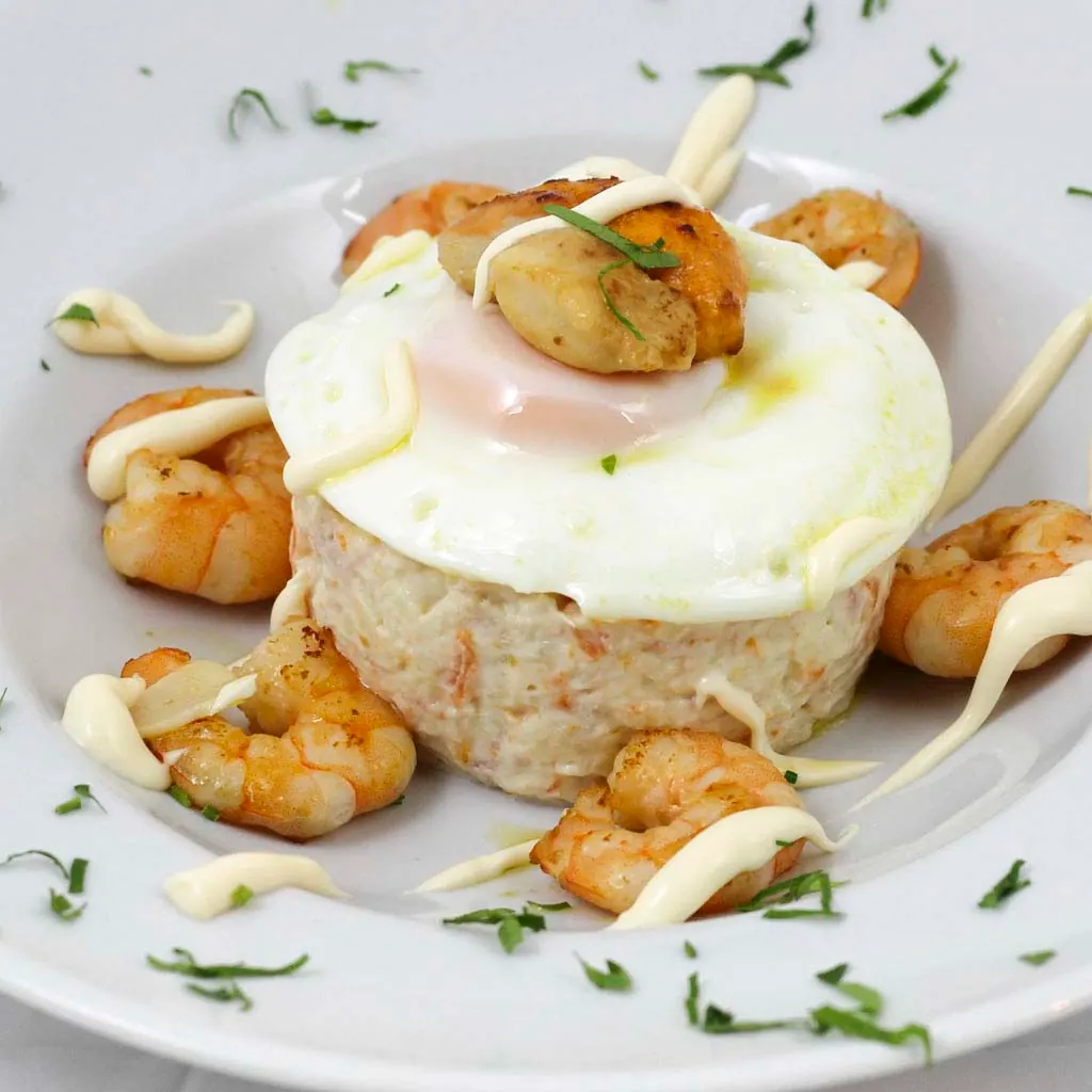 Russian potato salad with prawns and poached egg, starter at The Beefeater Fuengirola